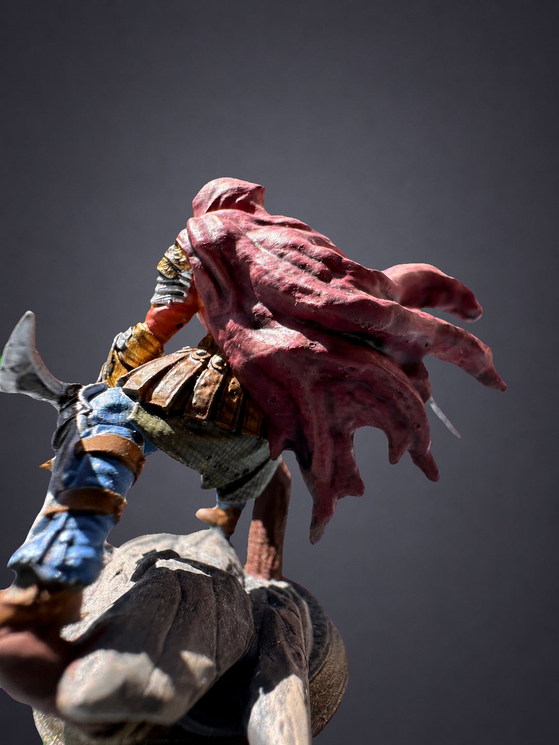 Serran painted assassin rogue - alternate angle of hand-painted DnD collector miniature on rocky base
