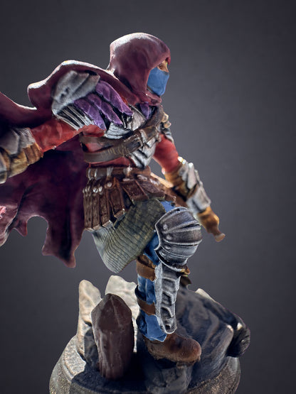 Serran painted miniature close-up - crimson cloak, gold-trimmed leather and blade detail